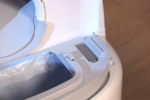 Properly installing waste bin in Tikpaws Smart Litter Box after changing garbage bag