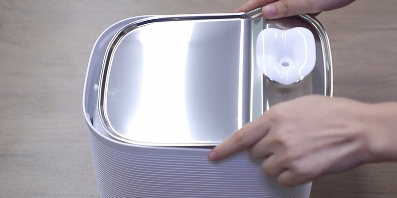 Attaching stainless steel tray and nozzle