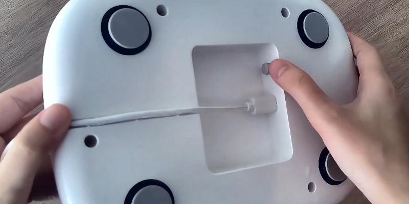 Connecting charging cable to the base